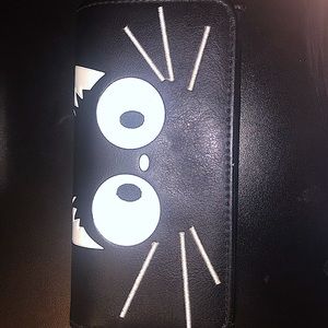 Kiki’s delivery service wallet Jiji